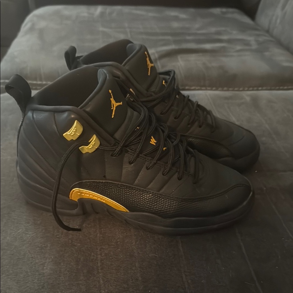 Black and Gold High-Top Air Jordan Shoes